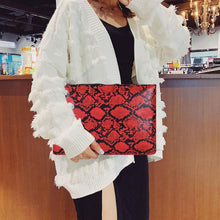 Load image into Gallery viewer, Snake Print Wristlet Clutch